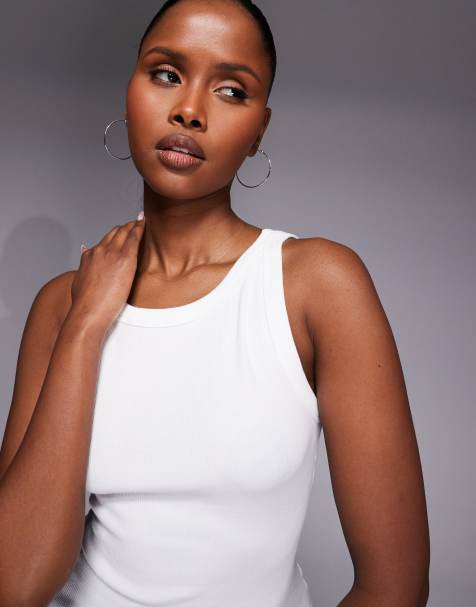 River Island - Top senza maniche bianco a coste con spalline sottili - view 1