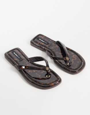  tortoise shell metal decal flip flop sandals in dark brown