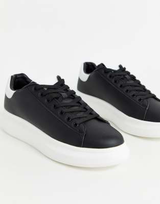 thick sole black trainers