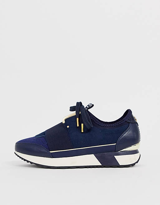River Island trainers with gold trim in navy | ASOS