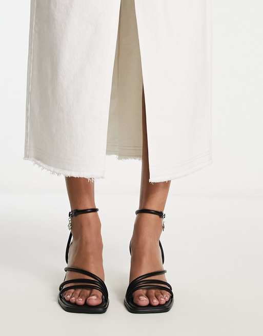 River Island tubular strappy heeled sandal in black | ASOS