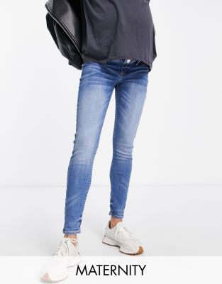 River Island - Umstandsmode - Jeans mit engem Schnitt aus mittelblauem Denim