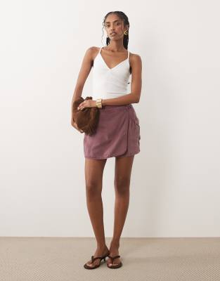 River Island utility mini skort with wrap detail in dark pink
