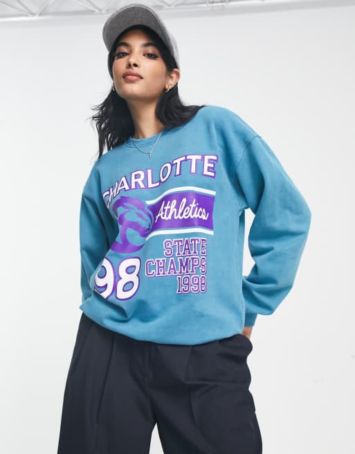 River Island varsity print sweat in blue | ASOS