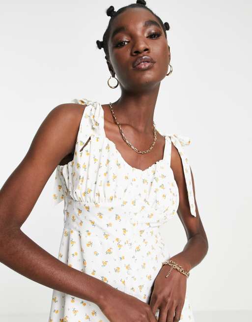 River Island Vestito sottoveste cru a fiori con coppe sul busto