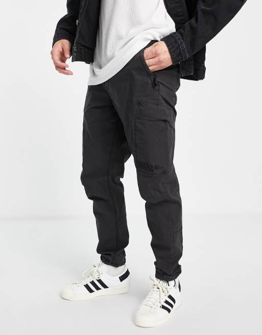 River Island washed pocket cargo pants in black | ASOS