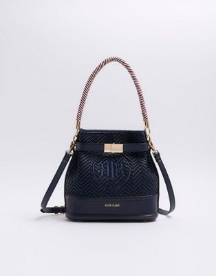 River Island Weave embroidered bucket cross body bag in navy