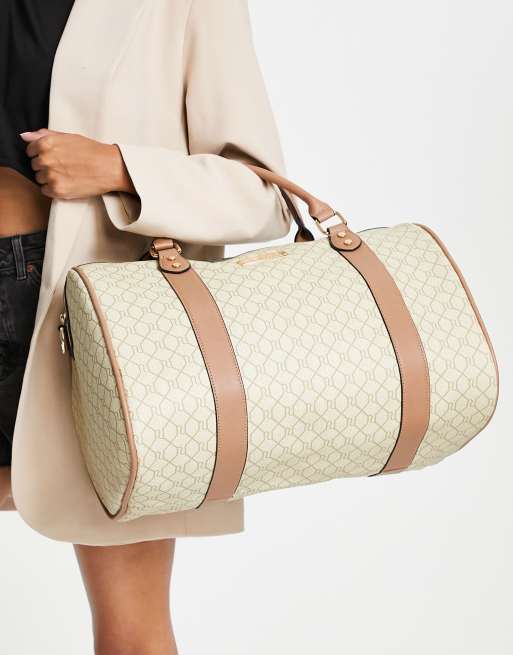 River Island Weekendtas met monogram in beige