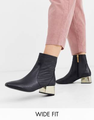black boots with metallic heel