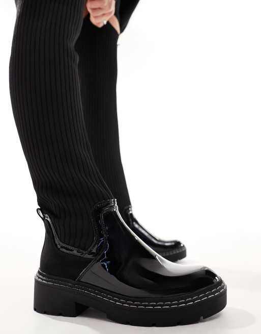 Black chunky patent store boots river island