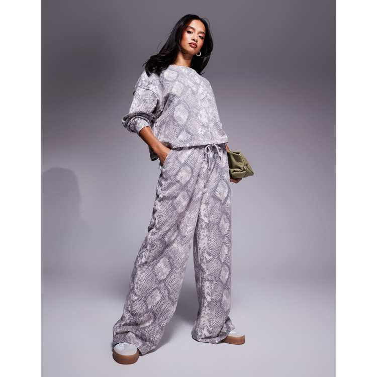 River Island wide leg jogger co ord in snake print ASOS