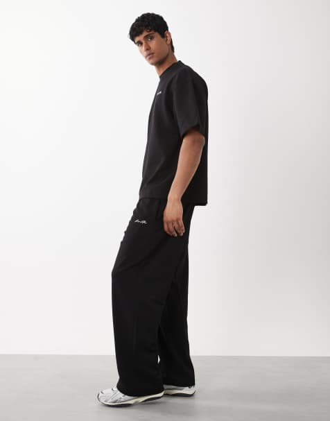 River Island wide leg 'luxe' sweatpants in black - part of a set - view 1