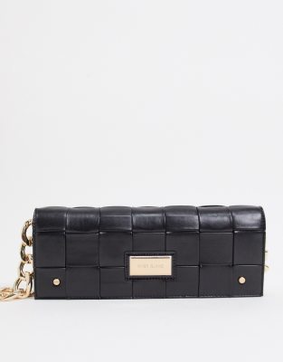 black woven clutch bag