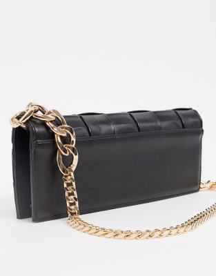 black handbag with gold chain