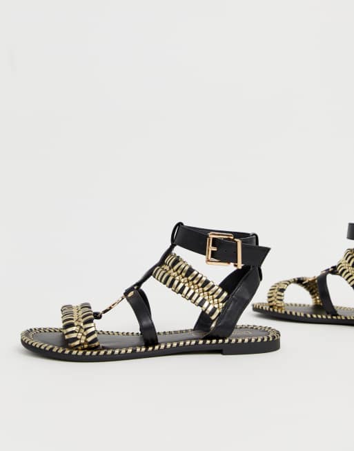 Black and store gold gladiator sandals