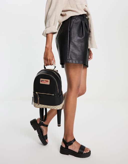 River Island zip pocket backpack in black