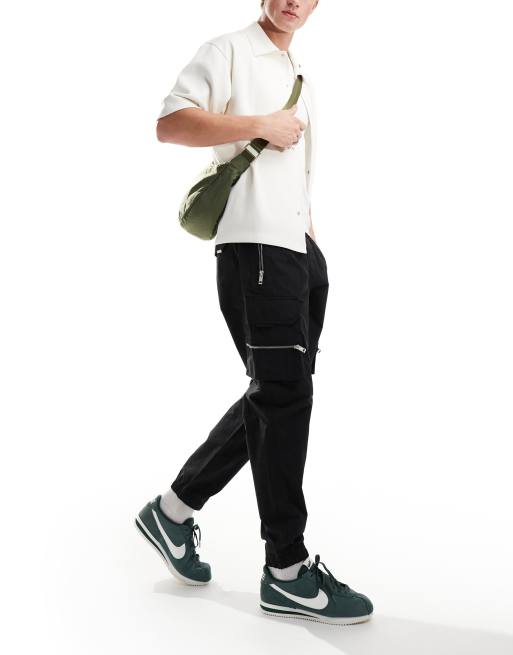 River Island zippy cargo pants in black 