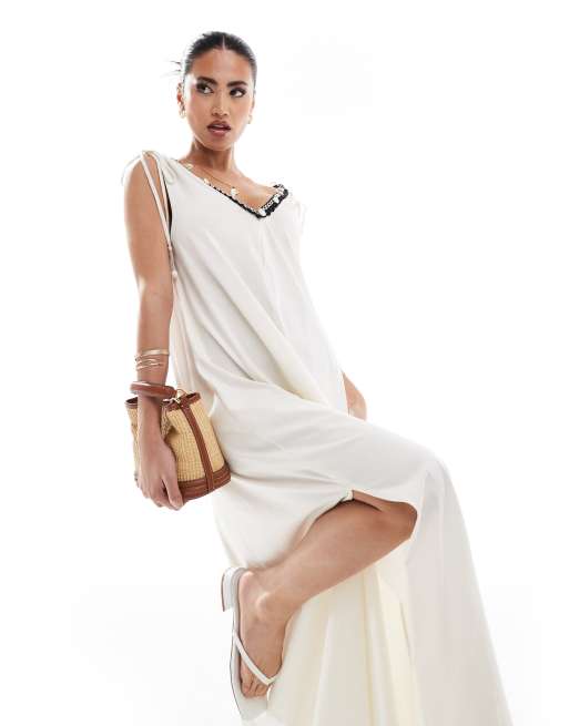 River Island – Zwiewna biała sukienka maxi z głębokim dekoltem