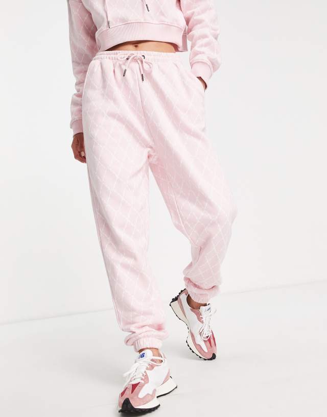 Roadies all over print sweatpants in pink - part of a set