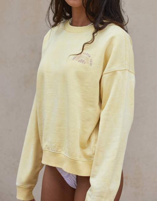 | in oversized sand sweatshirt featuring Kelia ASOS Roxy Tour Moniz