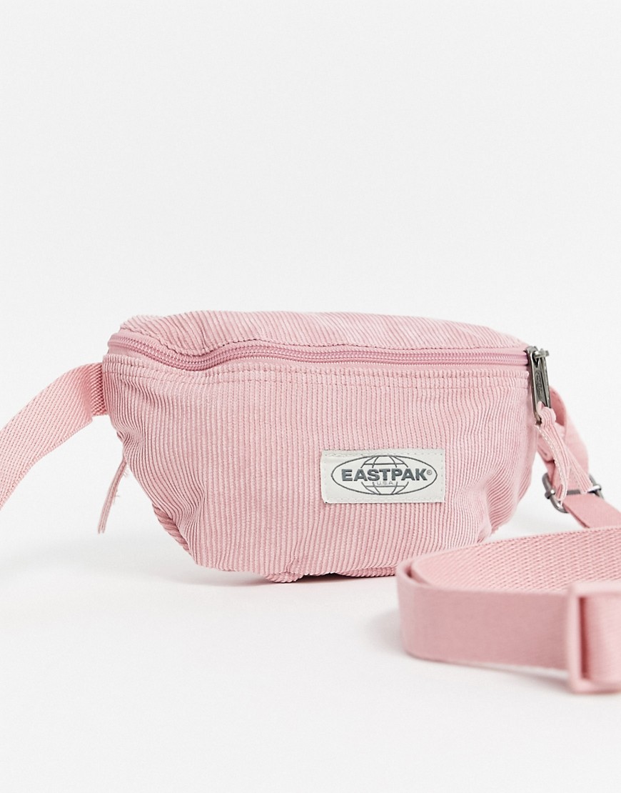 фото Розовая вельветовая сумка-кошелек на пояс eastpak-розовый