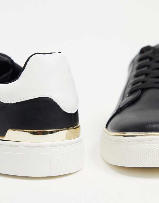 Black trainers store with gold trim