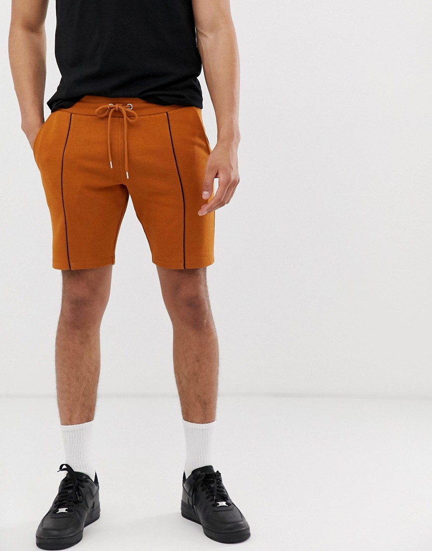 Rustfarvede skinny shorts i jersey med piping fra ASOS DESIGN-Orange