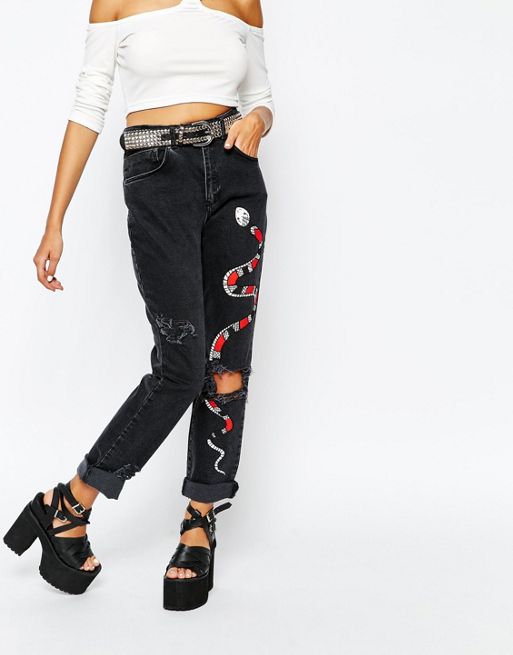 Черные джинсы с рисунком женские