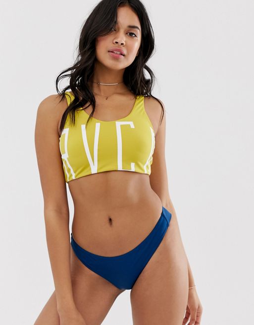 RVCA Womens Solid Low-Rise Cheeky Swimsuit Bikini Bottom : :  Clothing, Shoes & Accessories