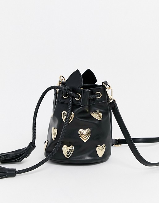 Sacred Hawk bucket bag with heart buckle and drawstring