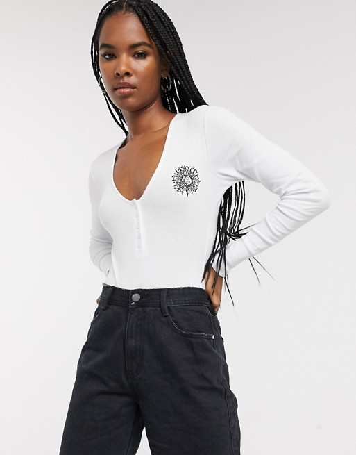 Sacred Hawk long sleeve body in rib with sun embroidery