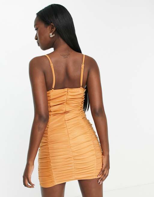 Saint Genies ruched v bar bodycon dress in orange | ASOS