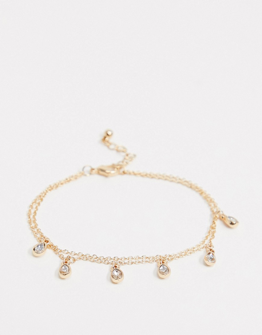 Saint Lola – Guldfärgat armband med droppformade kristallhängen