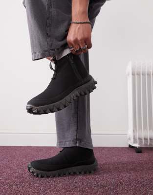 Salomon - Snowclog - Sneaker in Schwarz mit mittelhohem Schaft