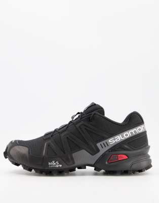 salomon black trainers