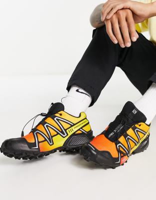 Salomon Spreedcross 3 gradient unisex trainers in orange and black | ASOS