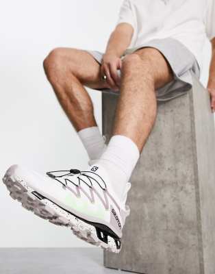 white salomon trainers