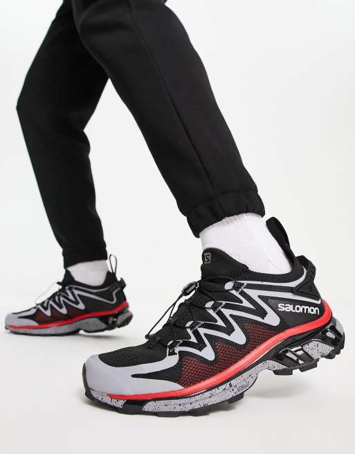 Salomon - XT-RUSH - Unisex sneakers in zwart en grijs 