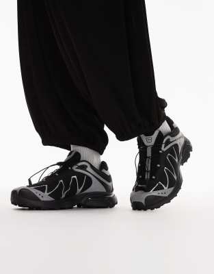 Salomon - XT-Whisper Nocturne Vision - Sneaker in Schwarz und Silber