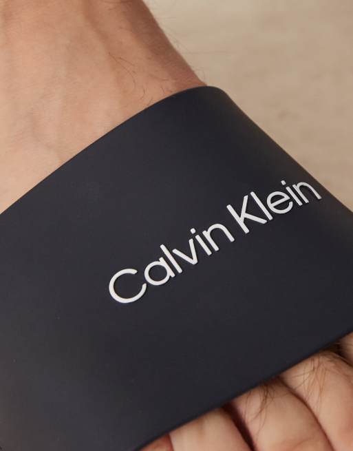 Sandalias azul marino sin cierres con logo de Calvin Klein, 3 de 4