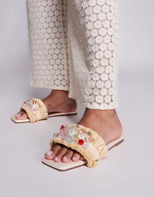 Sandalias beis planas con diseño tira con abalorios Lamar de SIMMI London - view 1