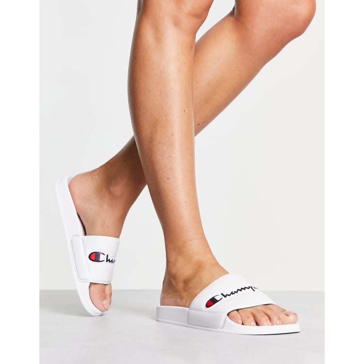 Sandalias blancas con de texto de Champion | ASOS