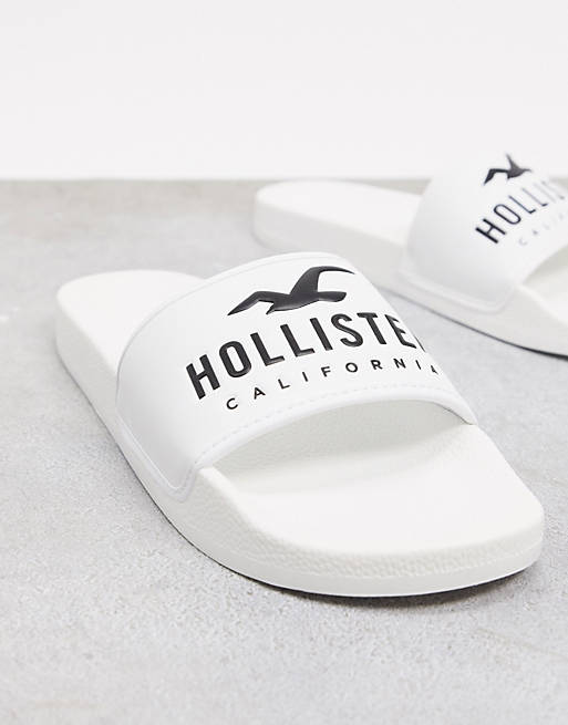 repentino Infantil inalámbrico Sandalias blancas con logo icónico de Hollister | ASOS