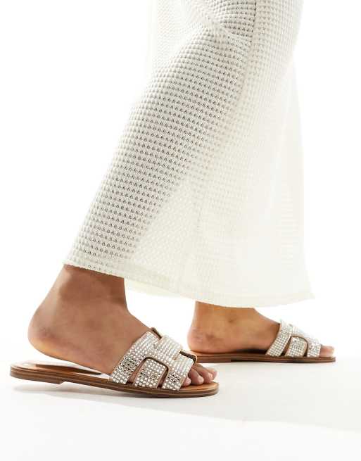 Sandalias color hueso planas y acolchadas con diseño adornado Elanaa de ALDO