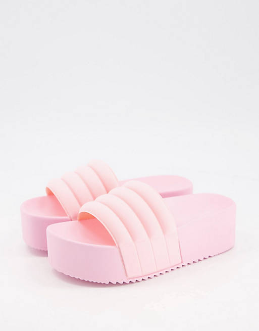 Sandalias color rosa bebé con plataforma plana Flori de ASOS DESIGN