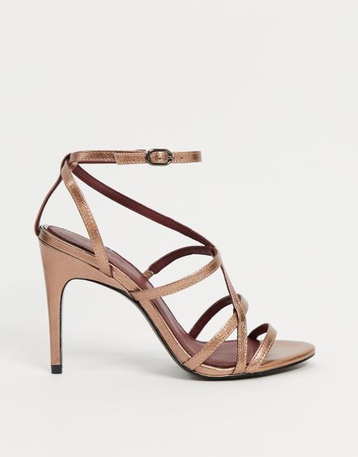 Sandalias de tiras con tacón de aguja en dorado rosa de Reiss 