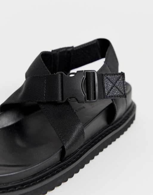 Sandalias deportivas con tira en el dedo en negro Freestyle de ASOS | ASOS
