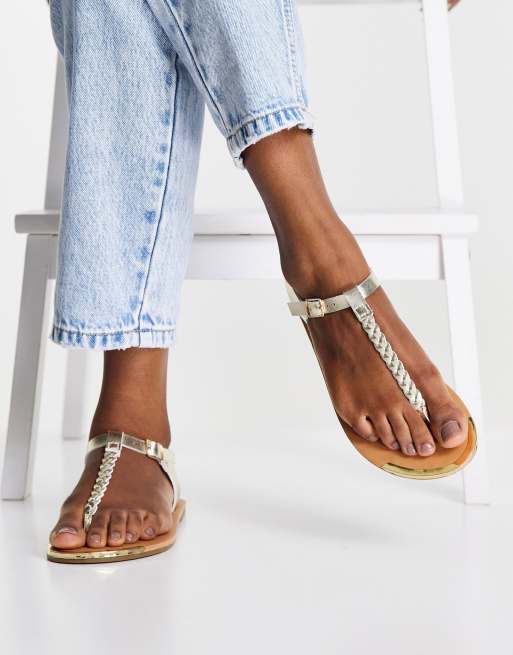 doradas de dedo con tira en forma de T y trenzado de Accessorize | ASOS