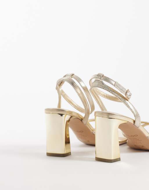 Sandalias doradas de tacón con correa en el tobillo Stellare de ALDO, 4 de 4