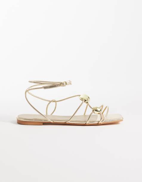 Sandalias doradas planas con detalle dorado de Glamorous - view 1